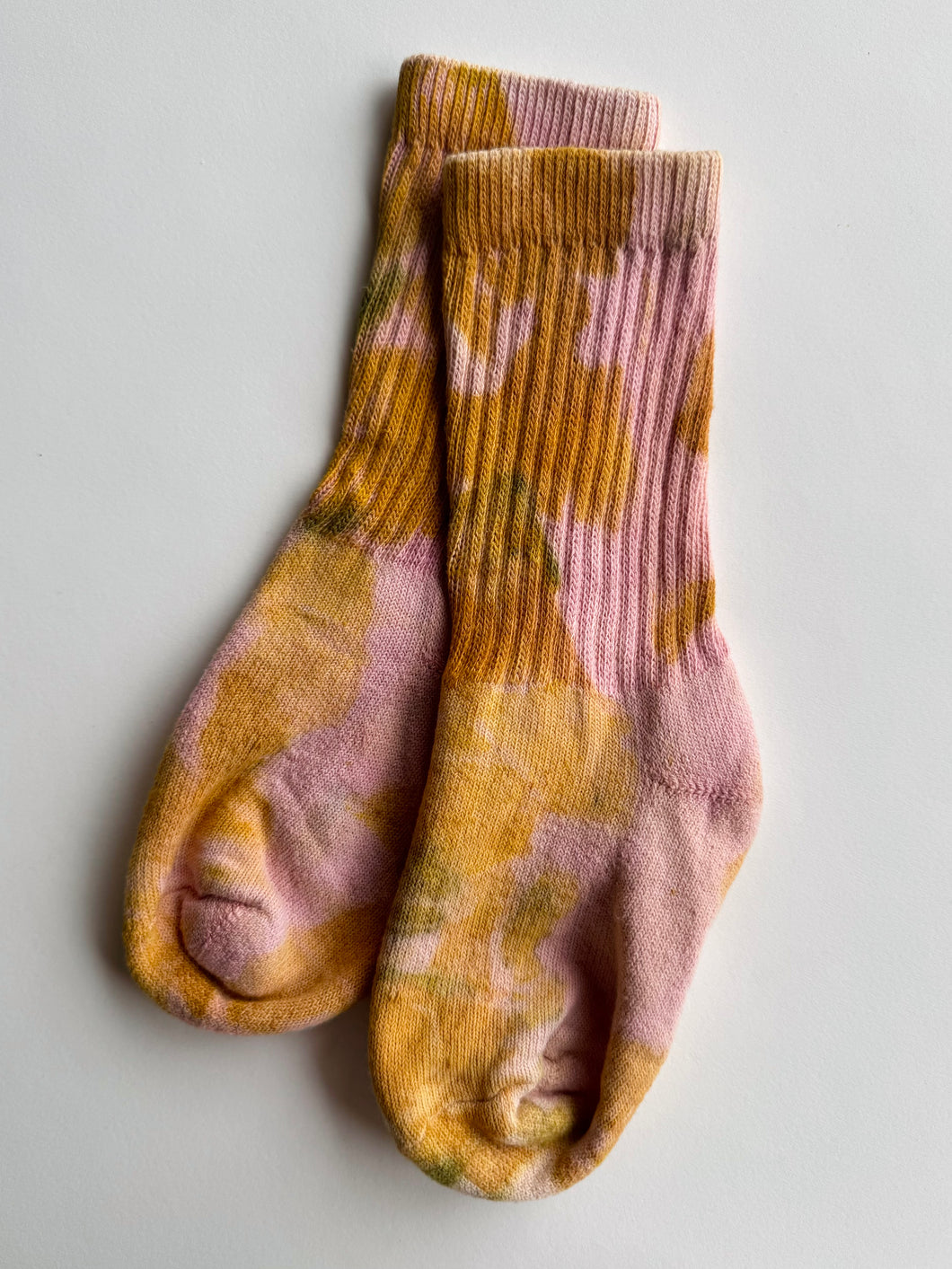 natural dye socks, cochineal and onion skins, small